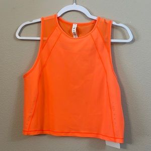 Orange lululemon work out top. Size 4.